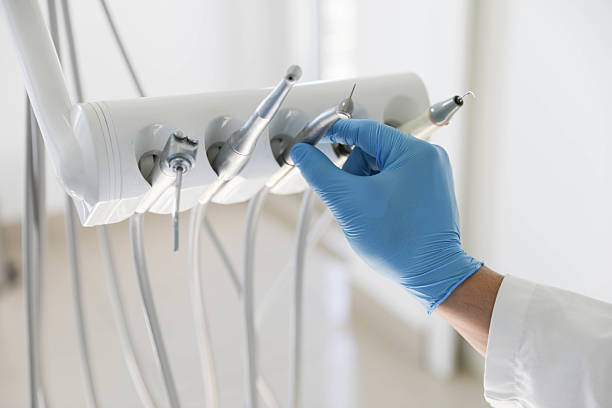 Professional Tooth Extraction technician working in Highland Park, TX